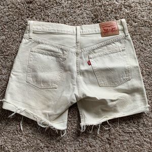 Levi’s white long shorts ripped/distressed